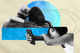 Two people sit close watching a moon-like orb another looks into their smartphone