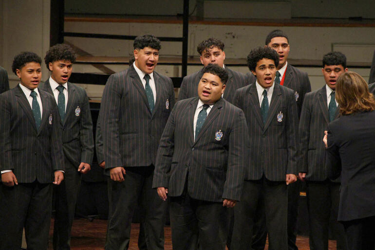 Soloist Xavier Jennings-Sio (centre front) and Dilworth School's 'Fortissimo' hit the harmonies in their Finale Gospel song.